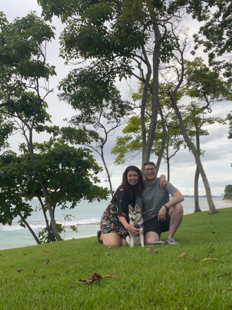 Family with our husky on a Costa Rica beach