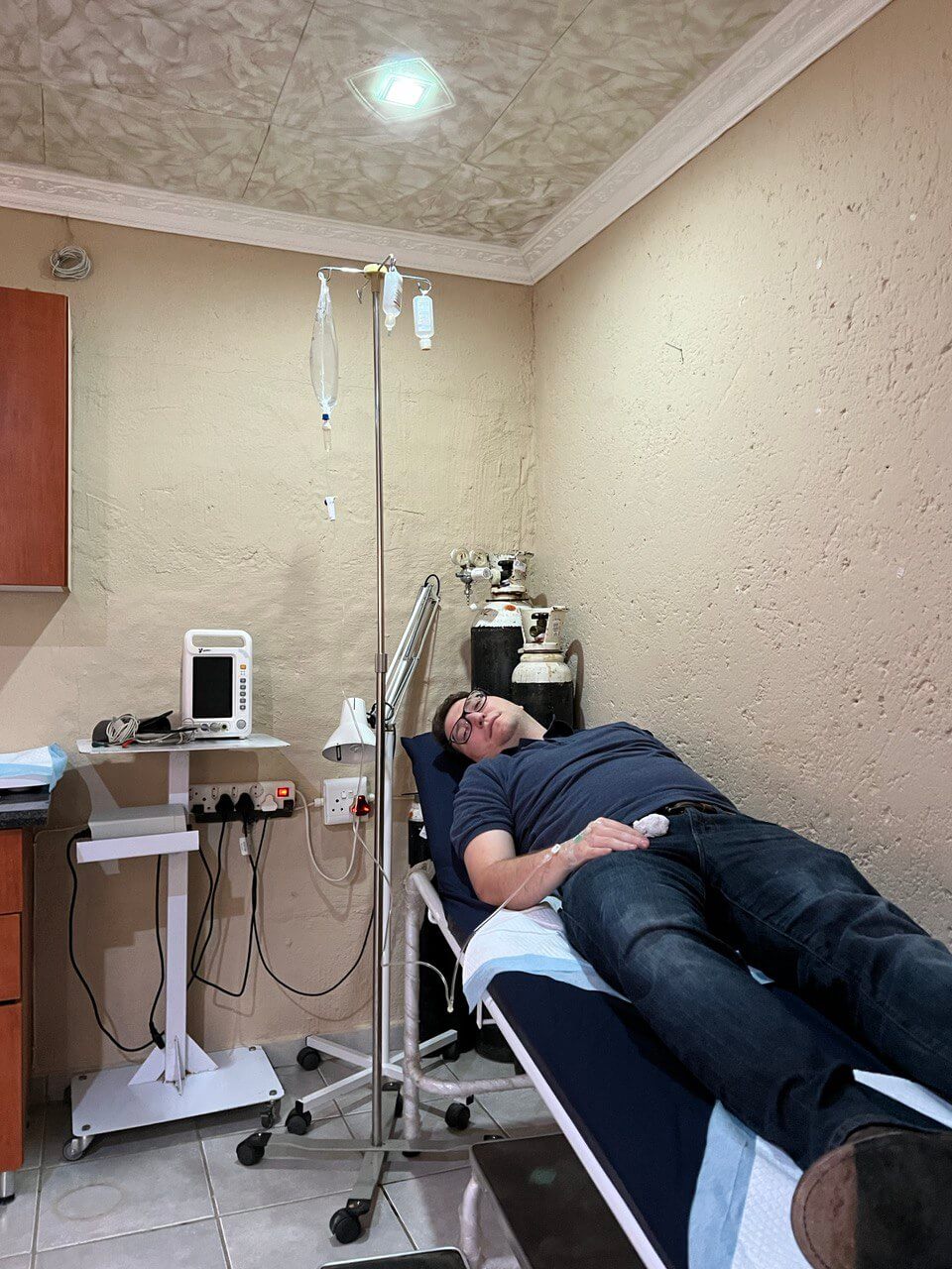 Recovering at a clinic in Africa after the seafood incident